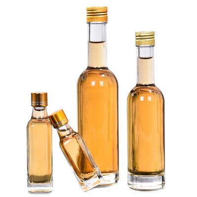 wholesale new design 30ml 50ml 100ml glass Olive oil bottle with cap 