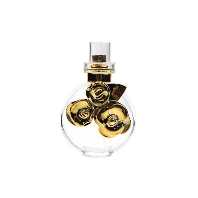 65ml clear round glass perfume bottle flower surface for sales 