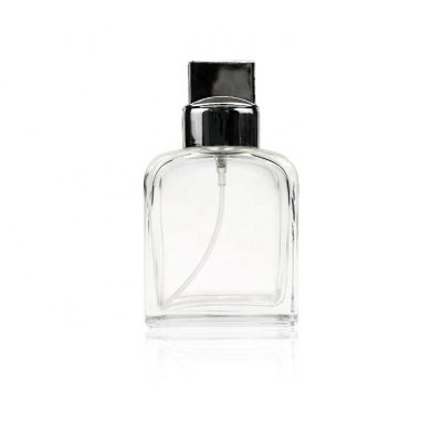 100ml Transparent Round Shoulder Square Perfume Bottle With Unique Rotating Button Cap Design 