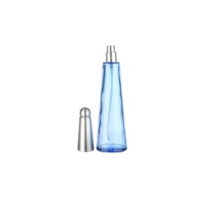 100ml light blue spray empty perfume bottle with silvery triangular cap for ladies 