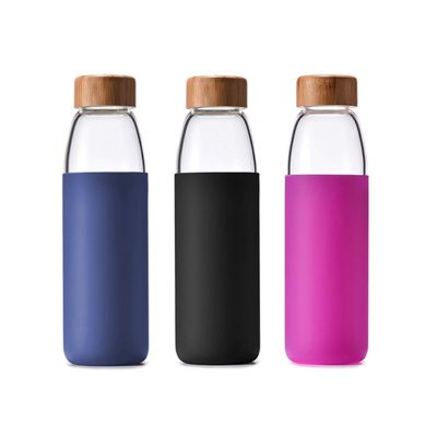 popular products 2019 high borosilicate bamboo lid hot water glass bottle unbreakable glass water bottle with silicone sleeve 
