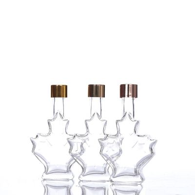 Unique 50ml Maple Leaf Shaped Glass Wine Bottle Glass Beverage Bottle with Screw Cap 