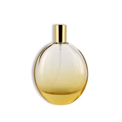 100ml light yellow nice pebble shaped glass perfume bottle with gold cap 