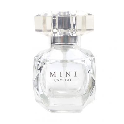 small empty glass spray perfume bottle