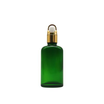 50ml cosmetic green flat glass essential oil bottle with gold aluminum basket dropper cap