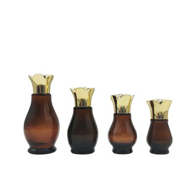 10ml 20ml 30ml 50ml unique gourd shape essential oil bottles with gold flower cap and inner plug