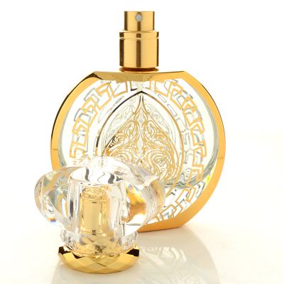 The new luxury 50ML bronzing glass perfume bottle is portable with fine spray 