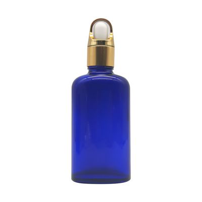 50ml cosmetic blue flat glass essential oil bottle with gold aluminum basket dropper cap