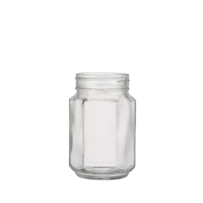 Food container 380 ml glass honey jar hot sale Hexagon shape glass jar with mental lids 