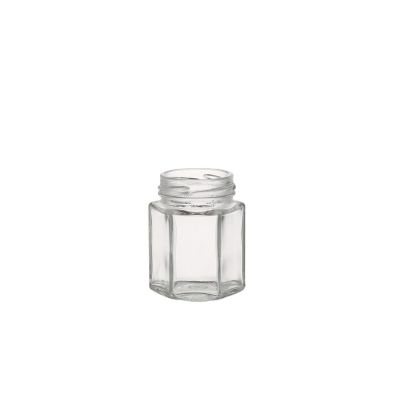 Factory price 100 ML food storage empty container glass hexagon honey jar with screw 