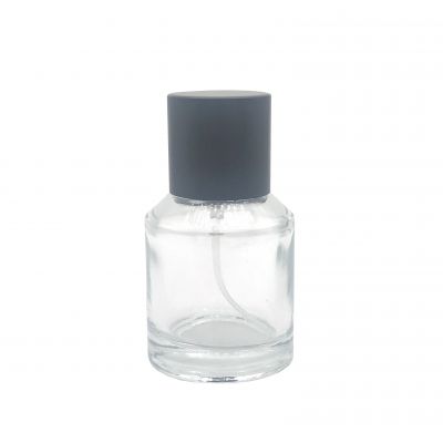 Cheap price 50ml round glass perfume bottle for matte black aluminum cap