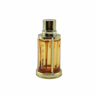 Golden yellow premium glass perfume bottle 