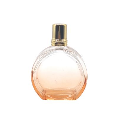 Orange flat circular perfume bottle fragrance bottle 
