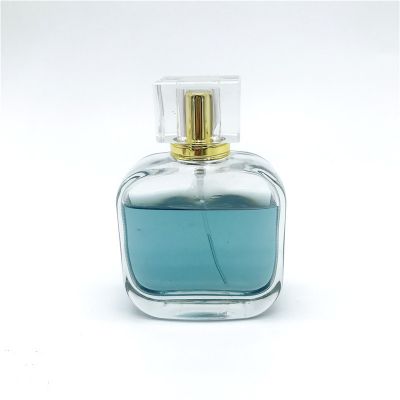 Wholesale customized 100ml newly designed glass perfume bottle with spray and customizable lid 