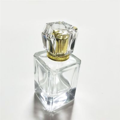 Hot sale perfume bottle 50ml portable transparent perfume bottle square glass perfume bottle 