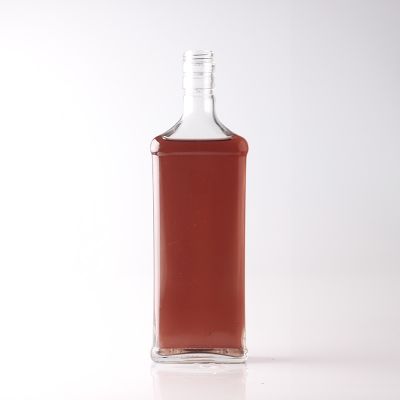 China manufacturer Transparent flint cylindrical whiskey bottle 
