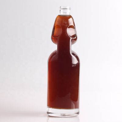 Botella de vidrio de vodka vacia de grado superior con precio bajo Botella de vodka de 750 ml con forma de calavera 