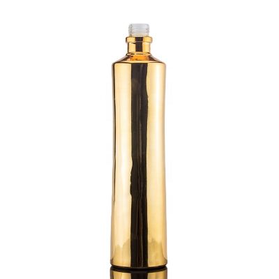 Customized Gold Color Plated Round Shape High Flint Liquor Spirits Glass Bottle For Vodka Whiskey With Screw Top 750ml