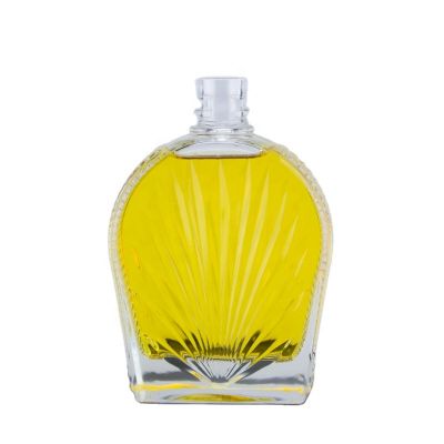 Unique Customized Fancy Embossed irregular Design 750ml Liquor Spirits Glass Bottle For Vodka Whiskey With Screw Top