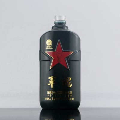 Custom Embossed Design Dark Green 500ml Liquor Glass Bottle With Pentagram Logo 