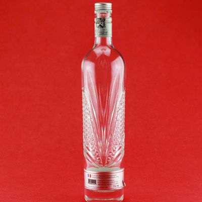 Avant-Garde Embossed Vodka Bottle Unique Glass Bottle 700ML Glass Whiskey Bottle Ropp Cap Custom Logo 