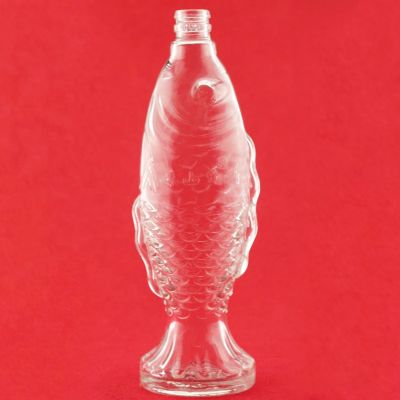 Hot Selling Fish Shaped Glass Liquor Bottle Embossed Pull Tequila Brandy Spirits Whiskey Vodka Glass Liquor Bottle With Ring Cap 