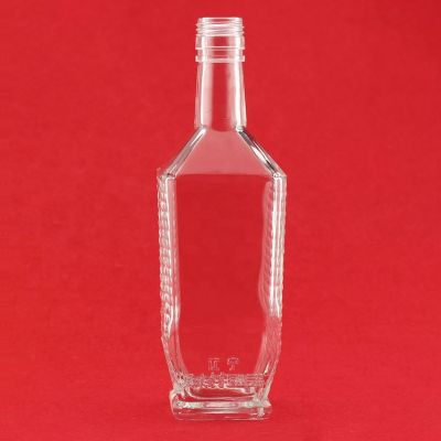 Manufacturers Personalized Embossed Custom Label Narrow Bottom Spirit Glass Bottle With Screw Cap 
