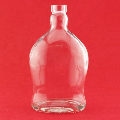 Custom Design Unique Round Shape Glass Bottle 700ml Glass Vodka Bottle With TPE Cork Empty Vodka Spirits 