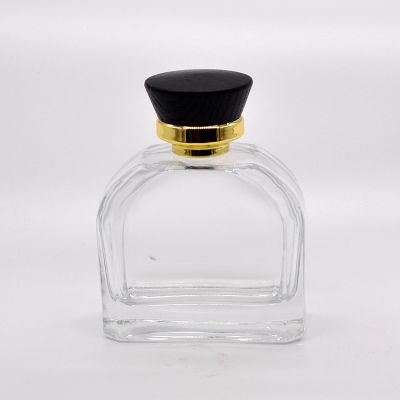 Semicircular empty wholesale unique essential perfume glassbottles with wood cap 100ml 