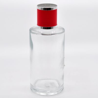 High quality 100ml cylinder shape perfume glass bottle with red leather caps 