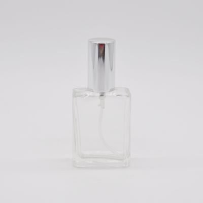 Empty designed high quality wholesale transparent OEM rectangle refillable glass perfume bottle with pump mist sprayer 