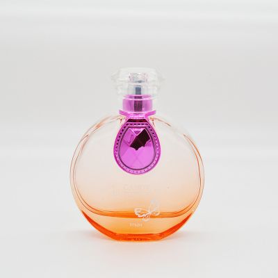 Beautiful design Empty 50ml flat round perfume spray glass bottle with squeeze pump 