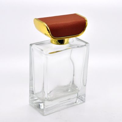 100ml luxury design empty glass perfume bottle with leather brown cover 