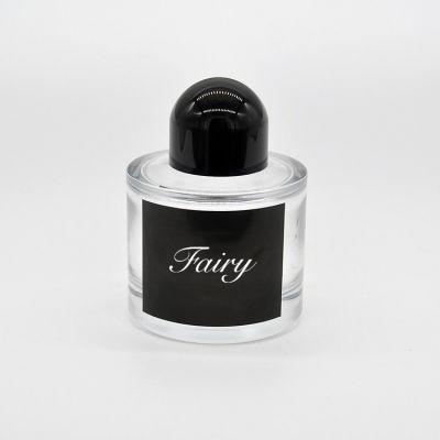 New design custom 100ml cylinder glass spray perfume bottle with cover 