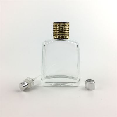 wholesale 100ml glass cheap perfume bottles with UV gold plastic cap 