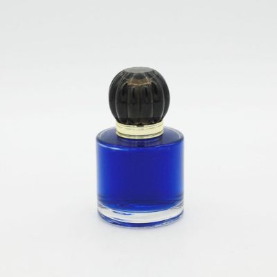 wholesale fragrance high quality fancy round cylinder 50ml glass perfume bottle