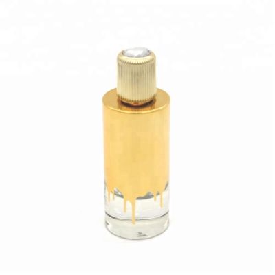 Refillable 100ml uv coating new design cylinder perfume glass bottle with your own logo design 