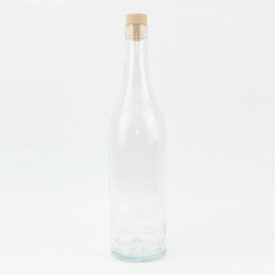 Clear empty 700ml wine glass bottles with wooden corks 
