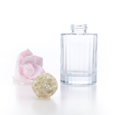 Custom Design Embossed Empty Diffuser Bottle 100ml Round Clear Aroma Bottle For Home Decor