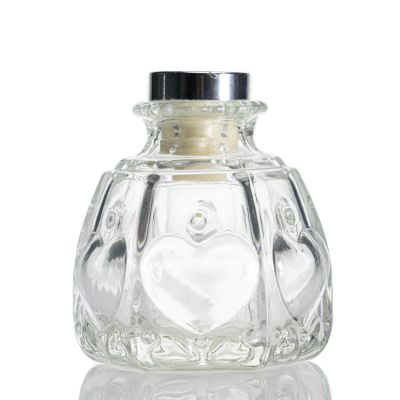 Wholesale Embossed Heart Shaped Clear Reed 100ml Diffuser Bottle With Cork