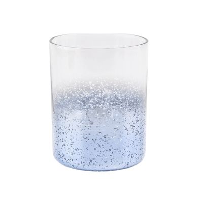 glass candle vessels with mercury decorations