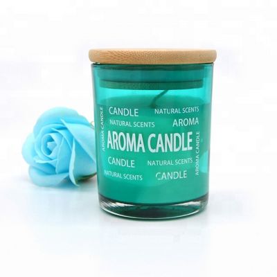 Religious activities Multi-colored scented candle with glass candle holder