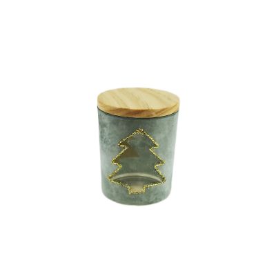 Glass candle jar with wood lid