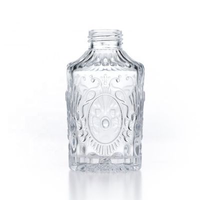 Clear 100ml round embossed glass diffuser bottle with screw cap