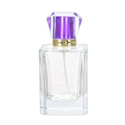 Luxury clear 100ml square cosmetic perfume glass bottle with gold aluminum sprayer acrylic cap