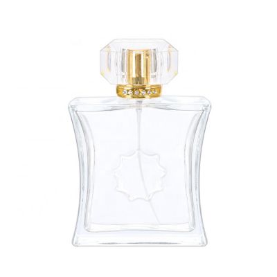 Luxury empty 100ml special shape clear crystal perfume glass bottle with gold aluminum sprayer acrylic cap