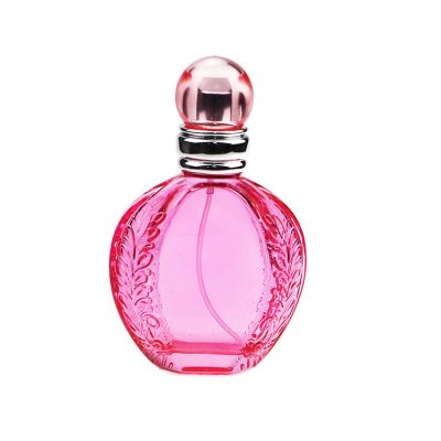 Custom 70 ML Round Pink Olive Leaf Oil Perfume Bottles Crystal For Ladies With Round Lid
