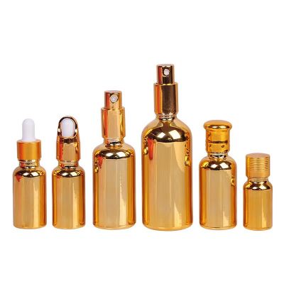 Luxury Empty Round Electroplate Gold Glass Dropper Bottles gold glass essential oil bottles