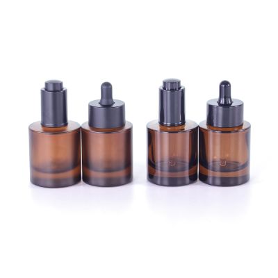 Factory price 30ml frosted amber cosmetic round shape high quality thick bottom glass essential oil packaging bottle