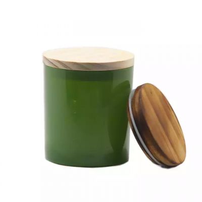 Glossy green glass candle jar wholesale candle holder with sealed wooden lid/smoked wooden lid/metal lid